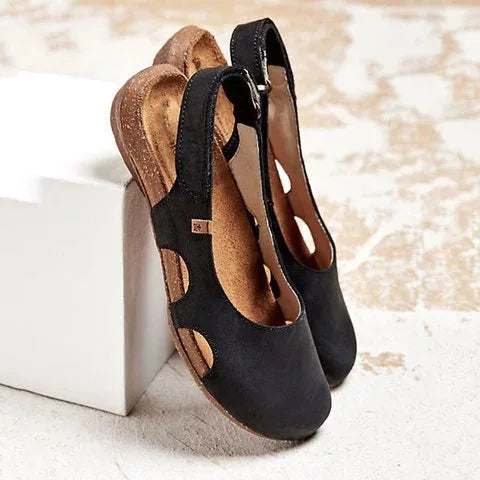 Ravena – Sandalias planas de piel con tira trasera