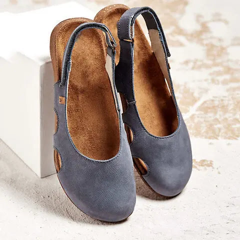 Ravena – Sandalias planas de piel con tira trasera