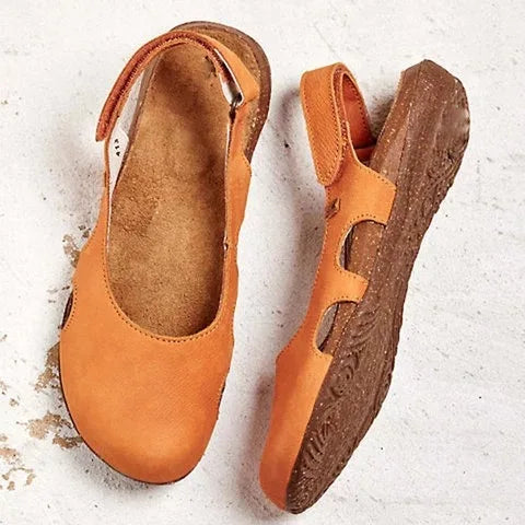 Ravena – Sandalias planas de piel con tira trasera