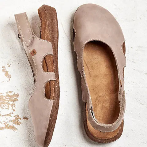 Ravena – Sandalias planas de piel con tira trasera