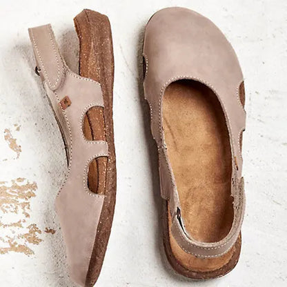 Ravena – Sandalias planas de piel con tira trasera
